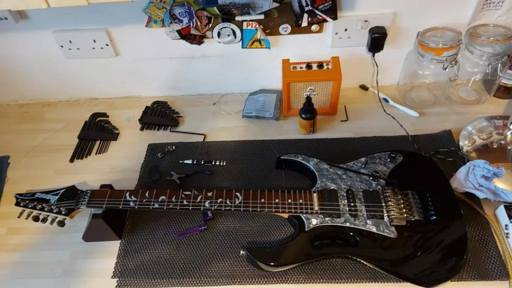 Luthier workshop setup detail with necks