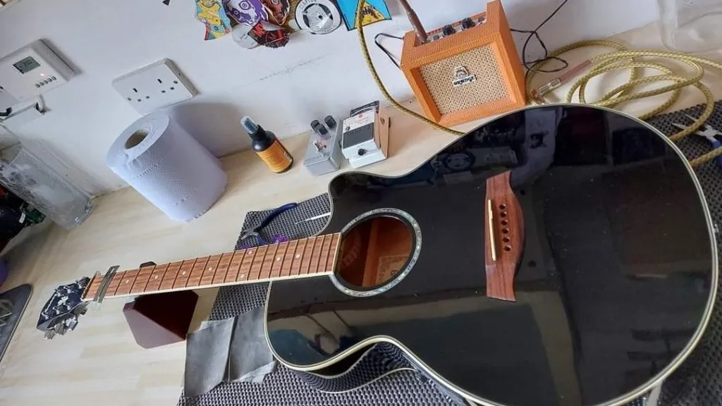 Guitar body bridge setup adjustment